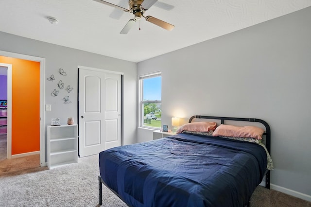 1087 Ayrshire Dr, Columbus, OH 43207 - carpeted bedroom featuring a closet, baseboards, and ceiling fan