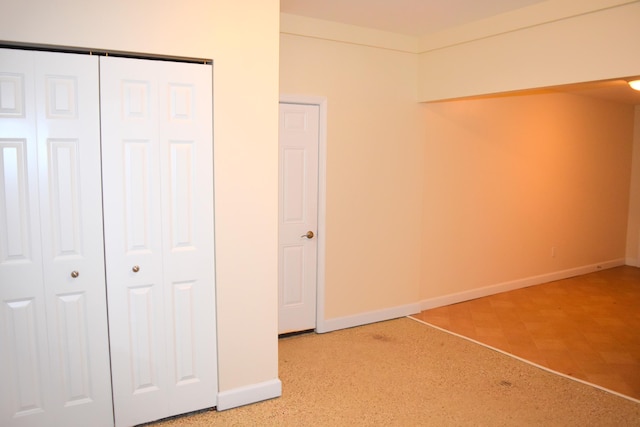 unfurnished bedroom with a closet