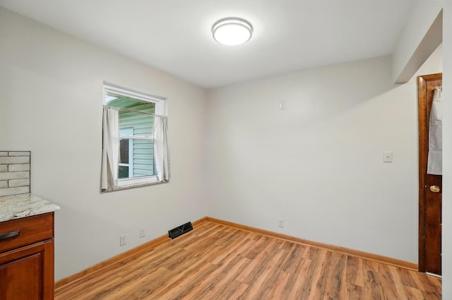 70 Helen St, Enon, OH 45323 - unfurnished room with light wood finished floors and baseboards