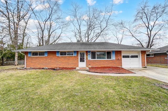 single story home with driveway, brick siding, an attached garage, fence, and a front yard