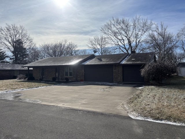 single story home with a garage