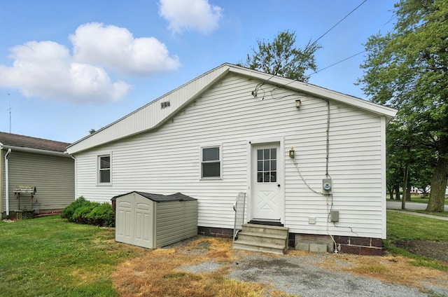 224 Monroe St, Delphos, OH 45833 - back of house with entry steps and a yard
