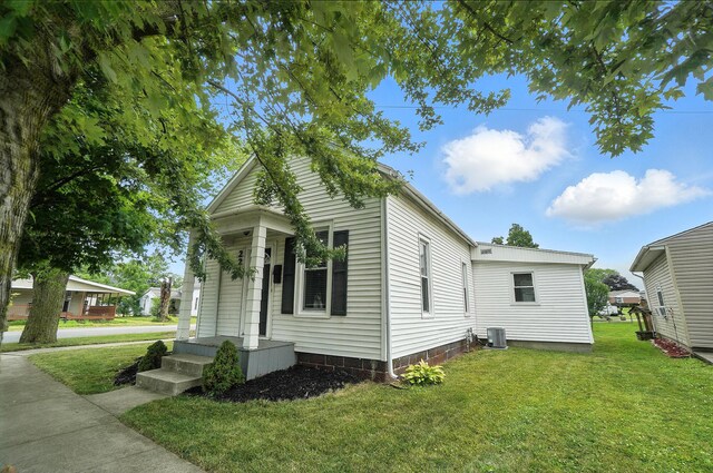 224 Monroe St, Delphos, OH 45833 - view of property exterior with a lawn