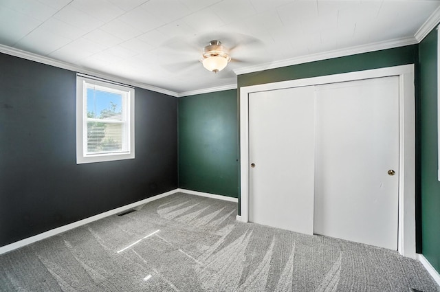 224 Monroe St, Delphos, OH 45833 - unfurnished bedroom featuring carpet flooring, ornamental molding, a closet, and ceiling fan