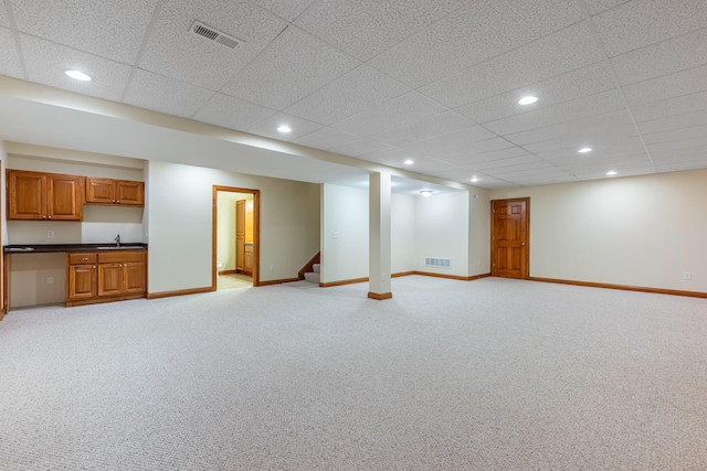 11370 Crottinger Rd, Plain City, OH 43064 - finished below grade area with a sink, light colored carpet, recessed lighting, baseboards, and stairway