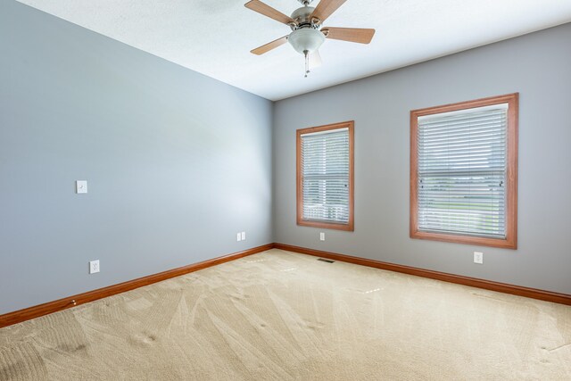 11370 Crottinger Rd, Plain City, OH 43064 - carpeted spare room featuring baseboards and a ceiling fan
