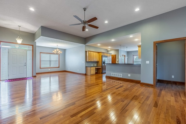 11370 Crottinger Rd, Plain City, OH 43064 - unfurnished living room featuring ceiling fan, light wood-style floors, baseboards, and recessed lighting