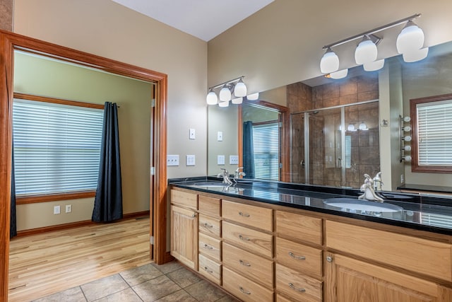 11370 Crottinger Rd, Plain City, OH 43064 - full bathroom featuring double vanity, a stall shower, and tile patterned flooring