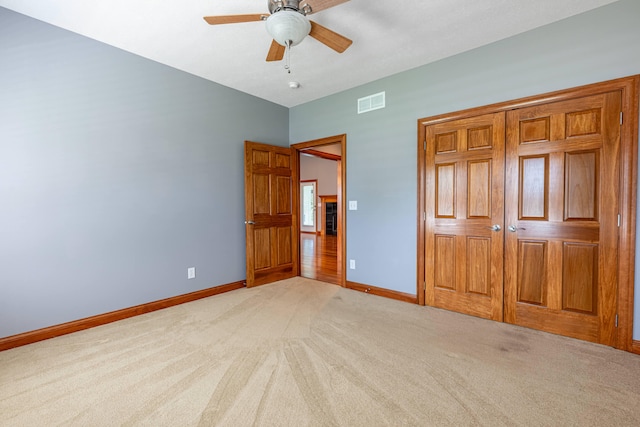 11370 Crottinger Rd, Plain City, OH 43064 - unfurnished bedroom with light carpet, baseboards, and a closet