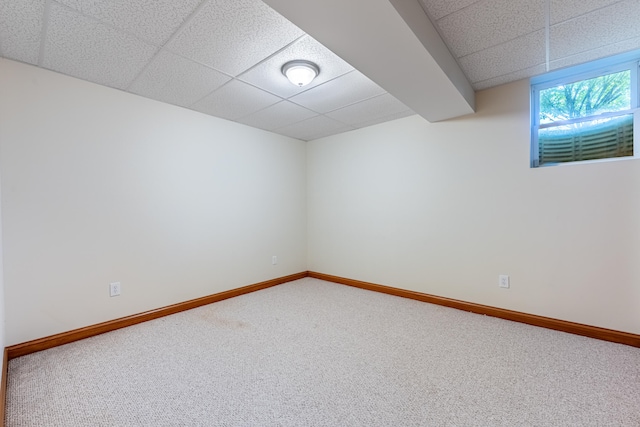 11370 Crottinger Rd, Plain City, OH 43064 - basement featuring a drop ceiling, carpet floors, and baseboards