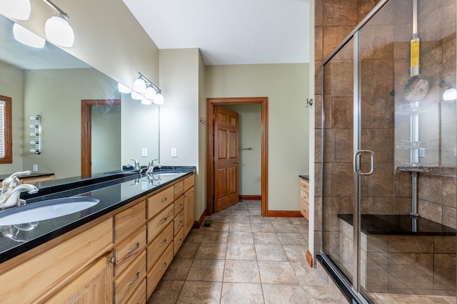 11370 Crottinger Rd, Plain City, OH 43064 - full bathroom featuring double vanity, a stall shower, and baseboards