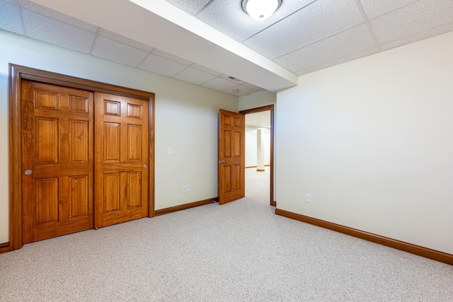 11370 Crottinger Rd, Plain City, OH 43064 - unfurnished bedroom featuring a paneled ceiling, light colored carpet, and baseboards