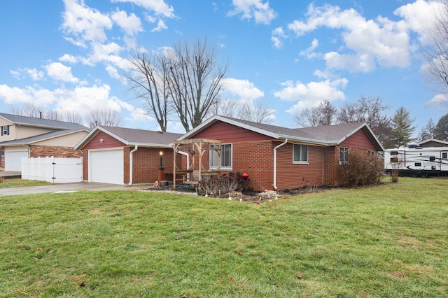 single story home featuring a garage and a front yard