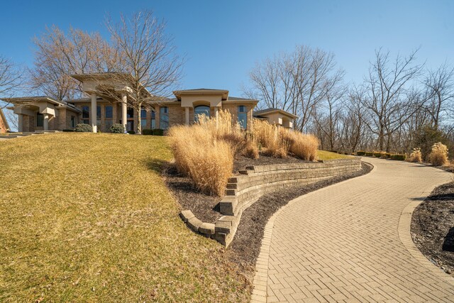 exterior space featuring a lawn