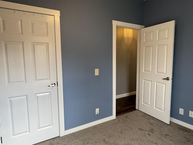 unfurnished bedroom with carpet