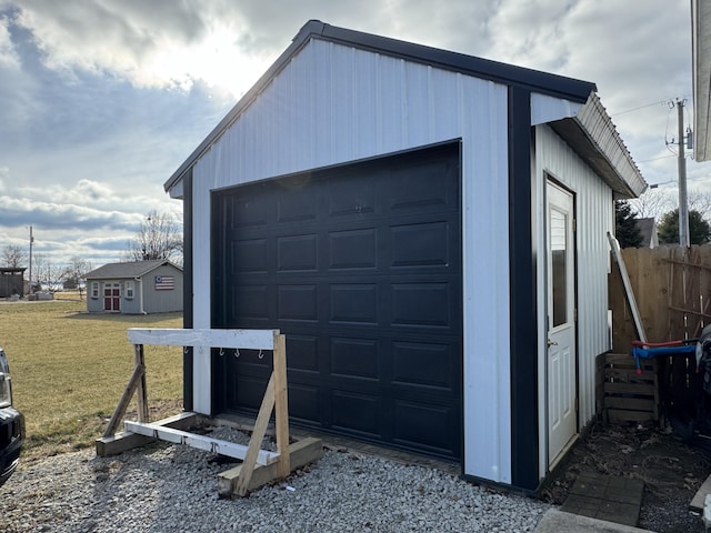 garage with a yard