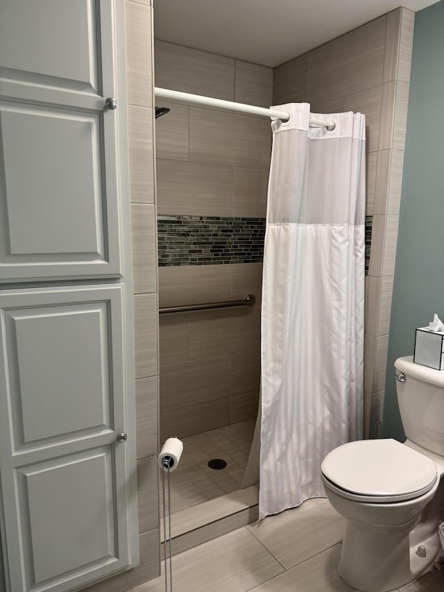 210 E Second St, Rockford, OH 45882 - bathroom with toilet and a shower stall