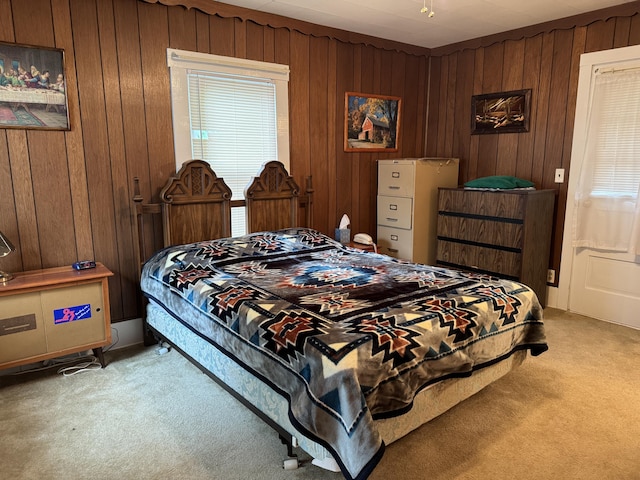 210 E Second St, Rockford, OH 45882 - bedroom with light carpet and wood walls