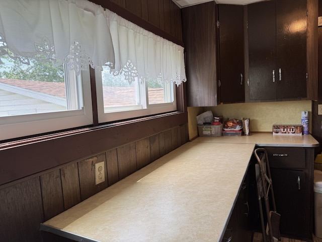 210 E Second St, Rockford, OH 45882 - kitchen with light countertops and dark brown cabinetry