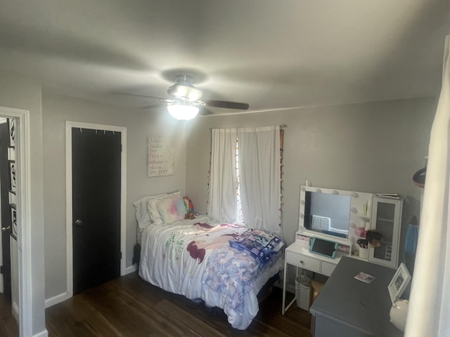 2412 W Spring St, Lima, OH 45805 - bedroom featuring wood finished floors, a ceiling fan, and baseboards