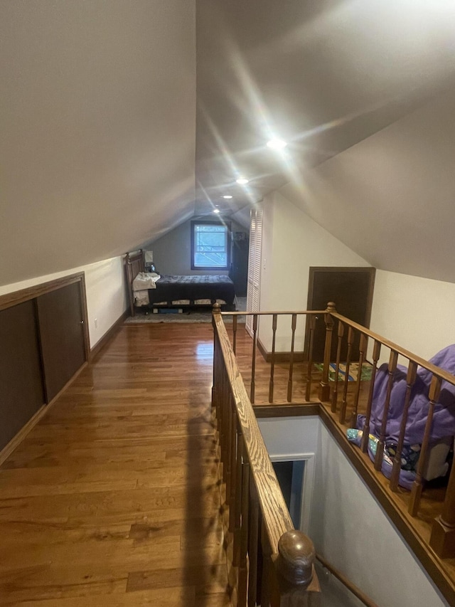 2412 W Spring St, Lima, OH 45805 - additional living space with dark wood finished floors and vaulted ceiling