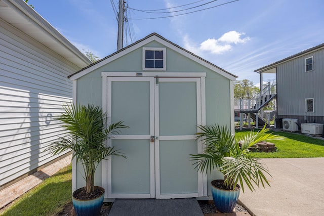 11068 Big Bear Path, Lakeview, OH 43331 - view of shed featuring stairs and ac unit