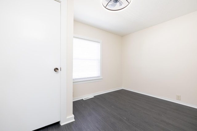 11068 Big Bear Path, Lakeview, OH 43331 - unfurnished room featuring dark wood finished floors and baseboards