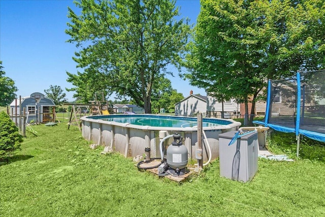 10474 Columbus St, East Liberty, OH 43319 - view of swimming pool featuring a trampoline and an outdoor structure