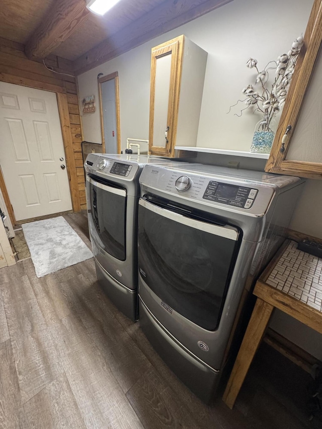 18866 Weimert School Rd, Wapakoneta, OH 45895 - laundry room with independent washer and dryer and dark wood-style flooring