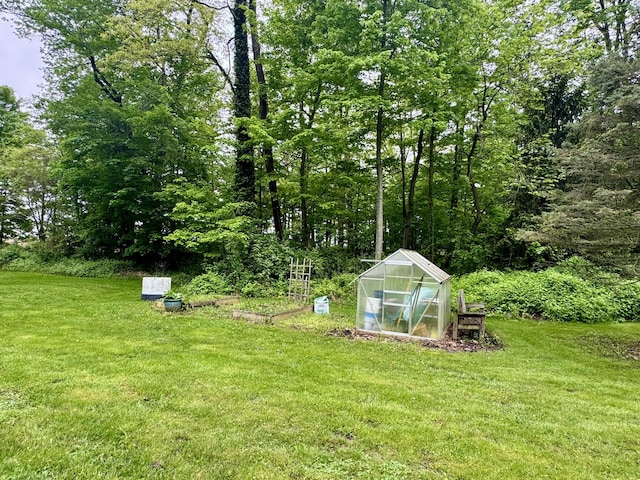 18866 Weimert School Rd, Wapakoneta, OH 45895 - view of grassy yard with an exterior structure and an outbuilding