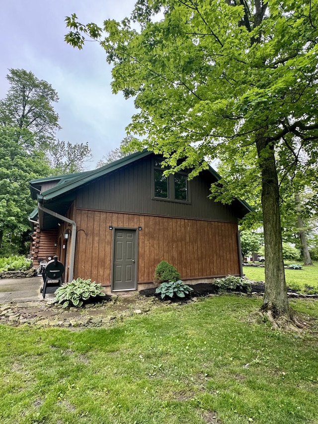 18866 Weimert School Rd, Wapakoneta, OH 45895 - view of property exterior with a lawn