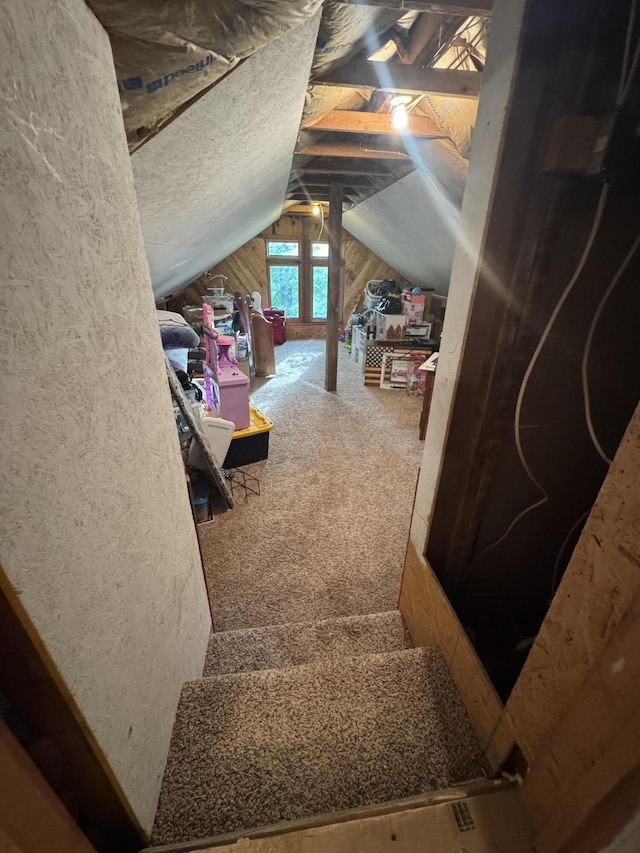 18866 Weimert School Rd, Wapakoneta, OH 45895 - stairs featuring vaulted ceiling and carpet flooring