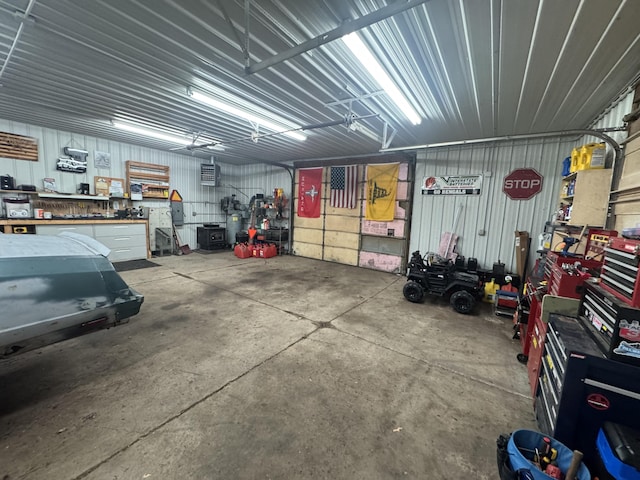 18866 Weimert School Rd, Wapakoneta, OH 45895 - garage featuring a workshop area
