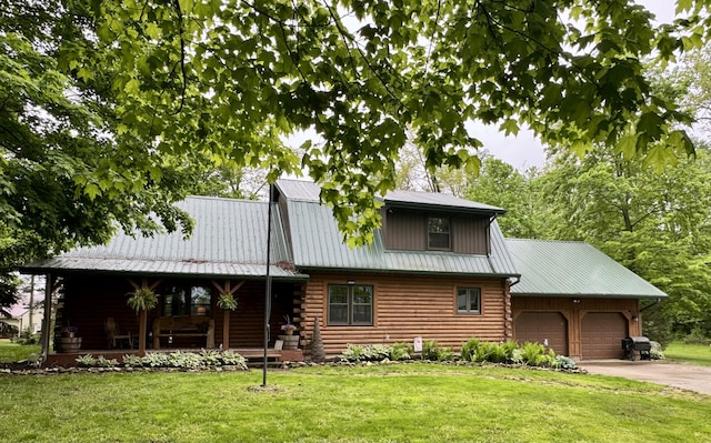 18866 Weimert School Rd, Wapakoneta, OH 45895 - log home with log siding, covered porch, a front yard, an attached garage, and concrete driveway