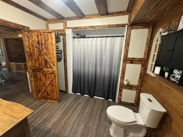 18866 Weimert School Rd, Wapakoneta, OH 45895 - full bathroom with wood finished floors, toilet, curtained shower, and wood walls