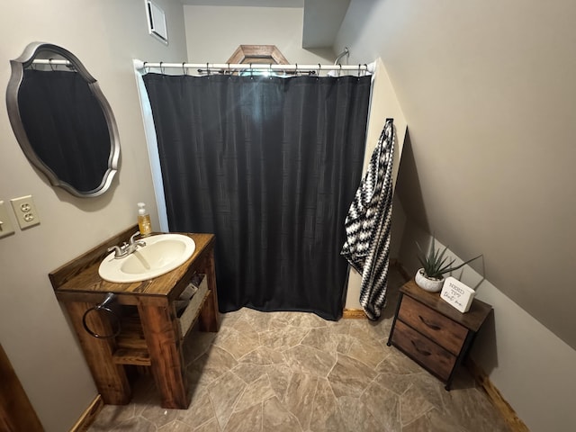 18866 Weimert School Rd, Wapakoneta, OH 45895 - bathroom featuring a sink and a shower with curtain