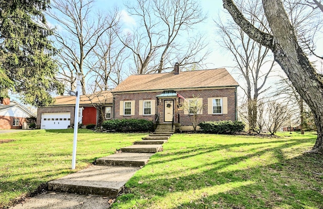 407 N Broadmoor Blvd, Springfield, OH 45504 - view of front of house with brick siding, a front yard, and a garage