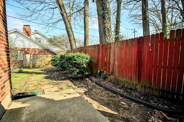 407 N Broadmoor Blvd, Springfield, OH 45504 - fenced backyard with a patio area