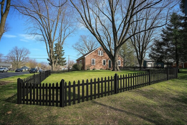 407 N Broadmoor Blvd, Springfield, OH 45504 - view of snow covered exterior featuring a chimney and brick siding