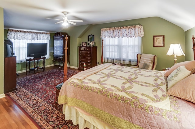 407 N Broadmoor Blvd, Springfield, OH 45504 - bedroom featuring lofted ceiling, wood finished floors, multiple windows, and ceiling fan