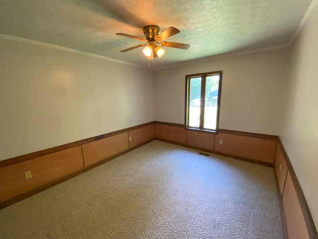 2700 Myeerah Trl, West Liberty, OH 43357 - carpeted empty room featuring ceiling fan, ornamental molding, and a textured ceiling