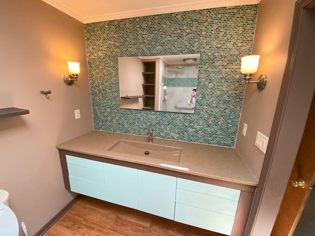 2700 Myeerah Trl, West Liberty, OH 43357 - bathroom featuring crown molding, vanity, toilet, and backsplash