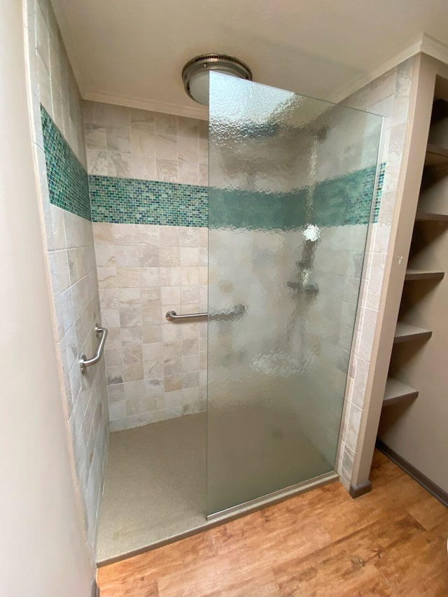 2700 Myeerah Trl, West Liberty, OH 43357 - full bath with a shower stall, wood finished floors, and ornamental molding