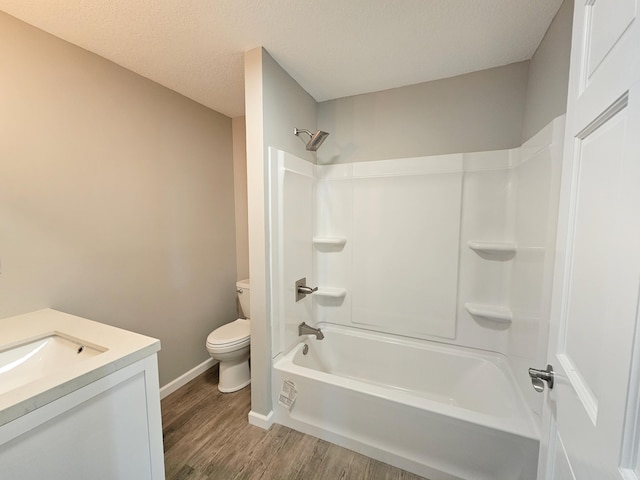 5412 Lock Two Rd, New Bremen, OH 45869 - full bathroom featuring vanity, wood finished floors, toilet, baseboards, and bathtub / shower combination