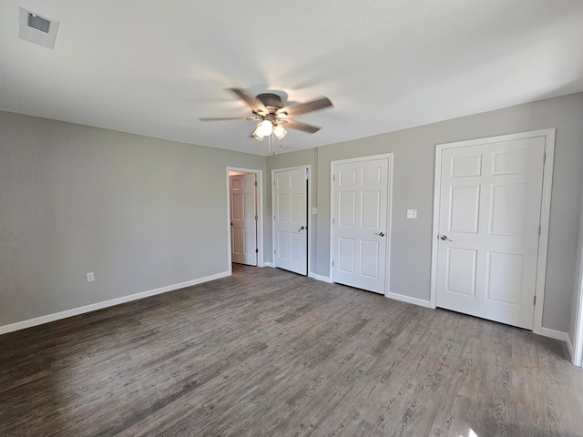 5412 Lock Two Rd, New Bremen, OH 45869 - unfurnished bedroom with visible vents, baseboards, and wood finished floors