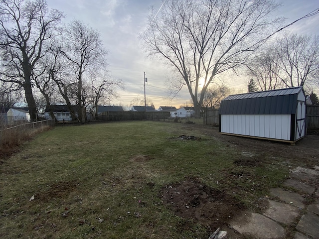 yard at dusk with a shed