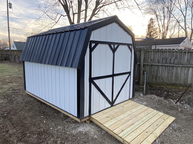 view of outdoor structure at dusk