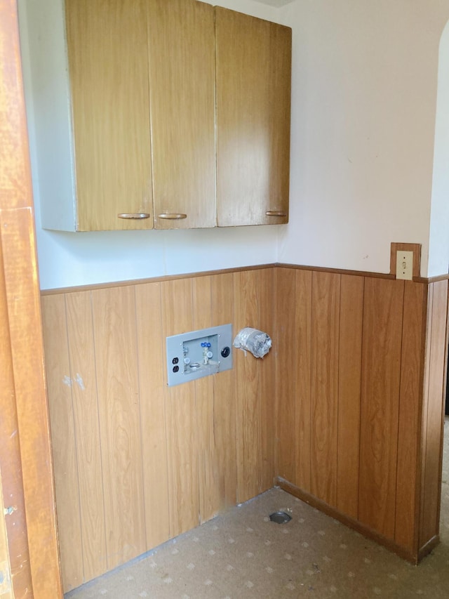 119 E Orchard St, West Manchester, OH 45382 - clothes washing area with cabinet space, washer hookup, a wainscoted wall, carpet floors, and wood walls