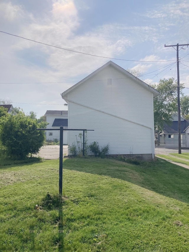 119 E Orchard St, West Manchester, OH 45382 - view of side of home with a yard