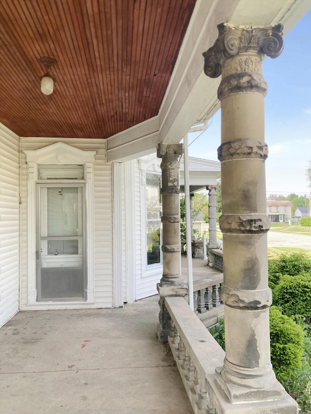 119 E Orchard St, West Manchester, OH 45382 - doorway to property featuring covered porch